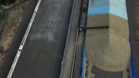 modern machinery unloading grain, agri-food industry in western australia