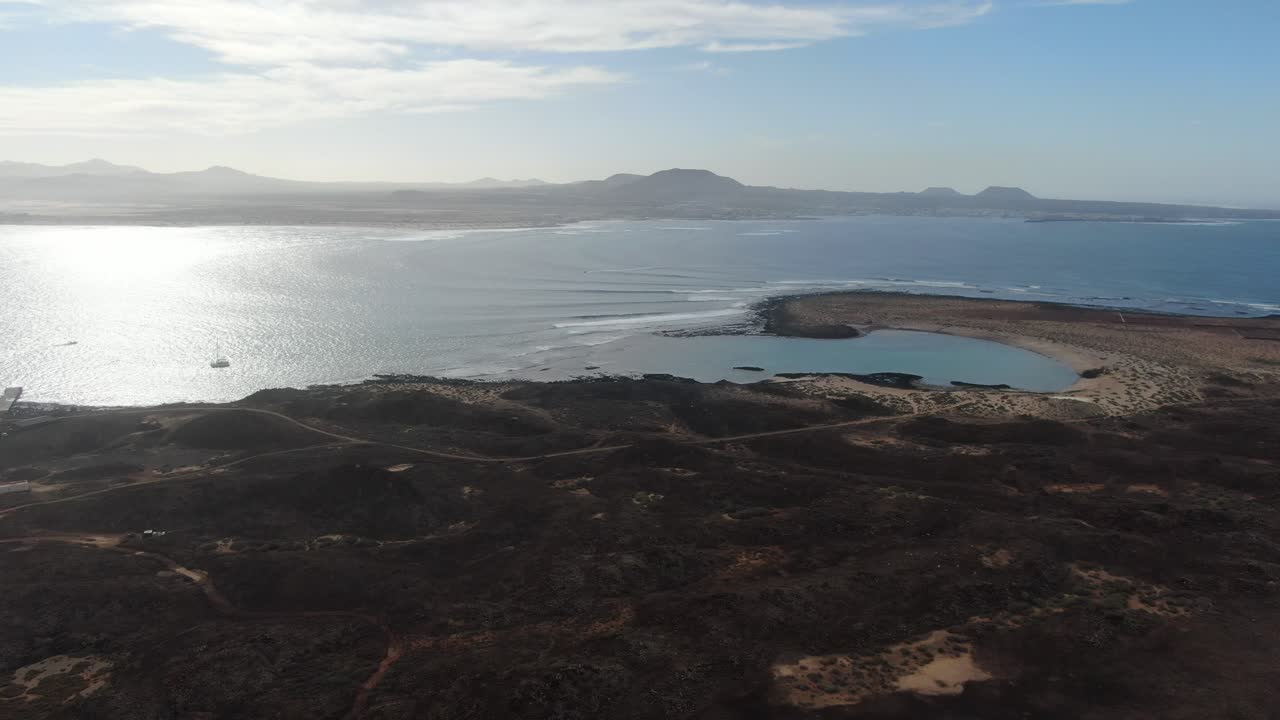 Isla de Lobos aerial footage looking to Corralejo, Fuerteventura