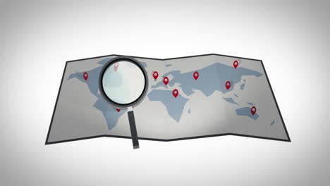 magnifying glass moves over a foldable paper world map with red pins