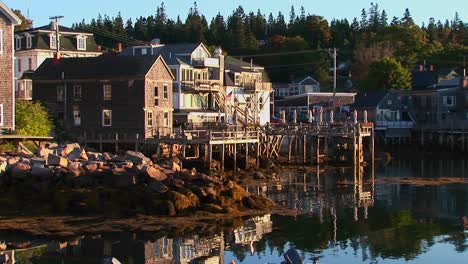 a lobster village in stonington maine is near water at day 1