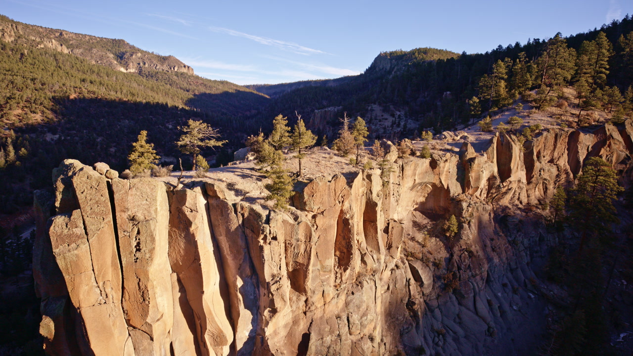 Drone perspective of jagged cliff edges near Los Alamos NM
