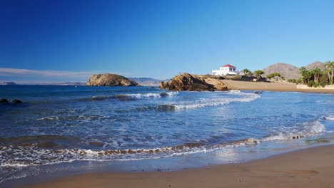 Panning-View-Over-The-Playa-De-Nares,-In-Puerto-De-Mazarrón