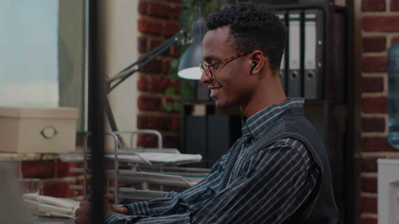 Sales assistant attending business meeting on video call