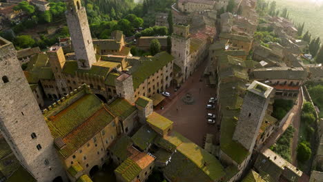 iconic towers rising on the hilltop townscape of san gimignano in siena, tuscany, north-central italy