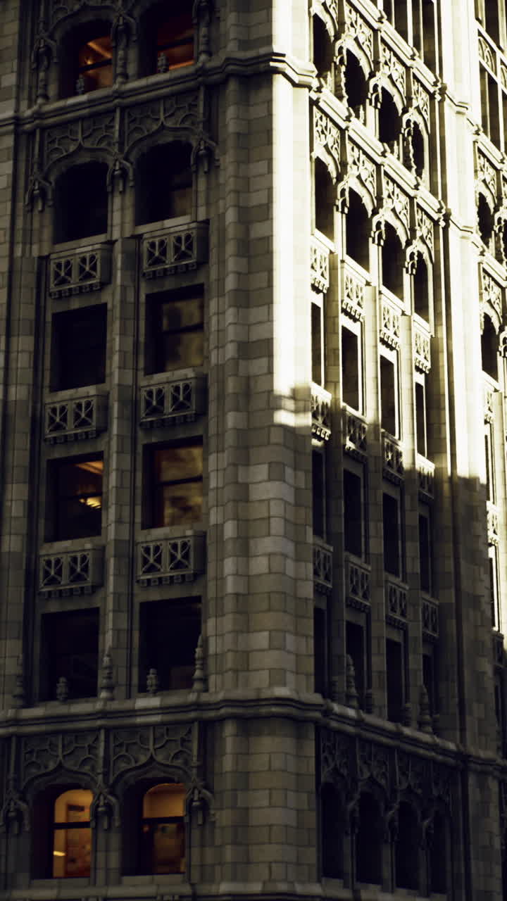 Historic building stands tall amid modern skyscrapers in urban setting