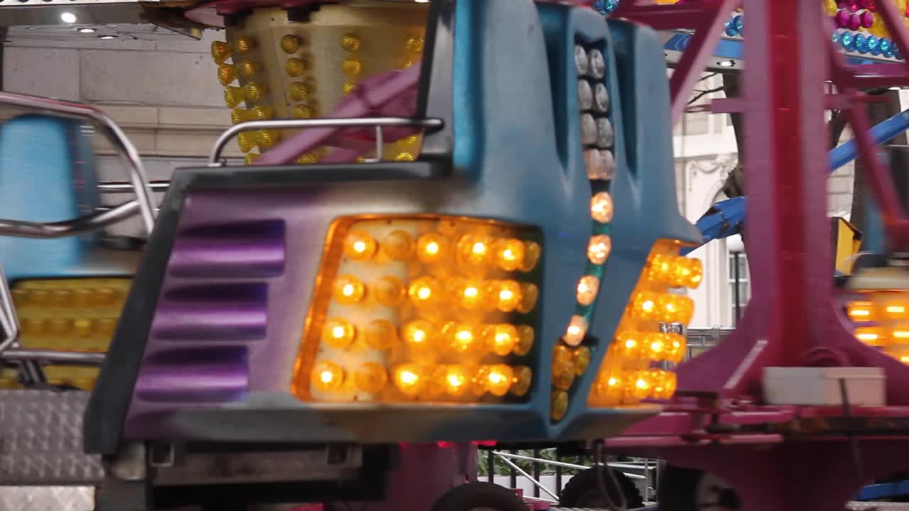 Revolving Amusement park where people are having fun - Dublin City Centre, Ireland