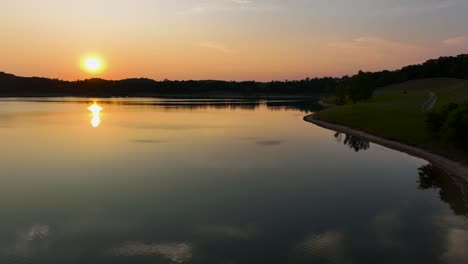 summer sun setting over the dunes in the distance