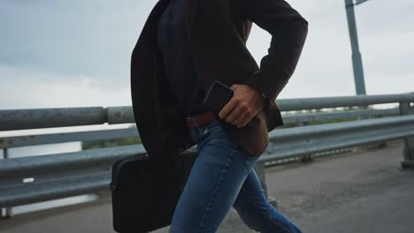 businessman running on a bridge