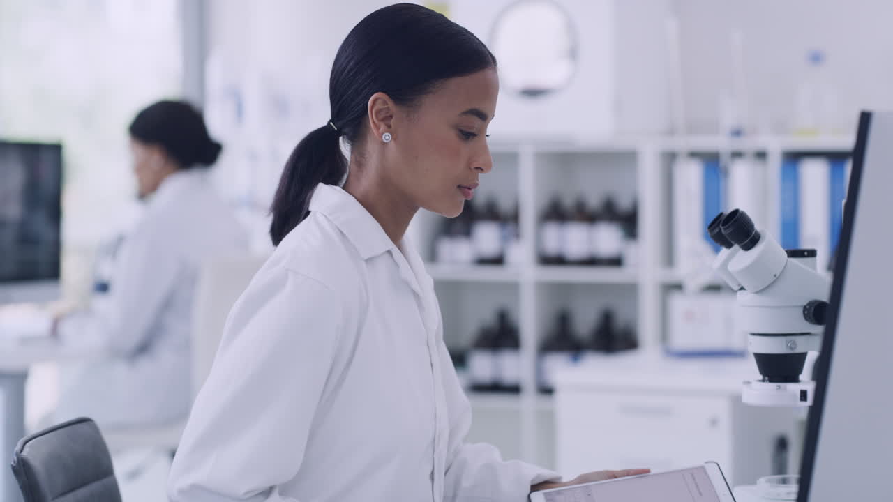 Young scientist using a digital tablet