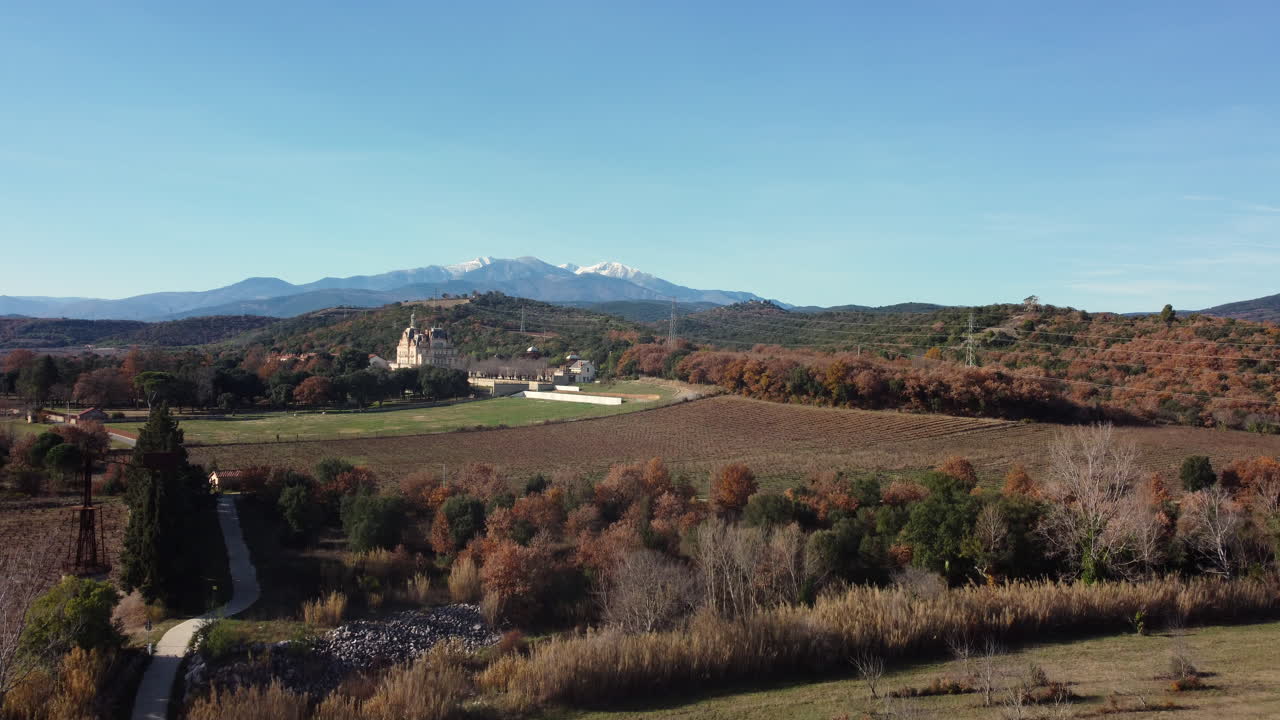 Aerial View of a Monastery and Vineyard in the Mountains