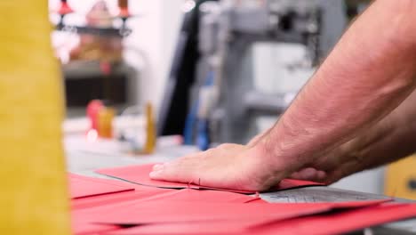 Italian-shoemaker,-making-leather-bag-with-traditional-machines