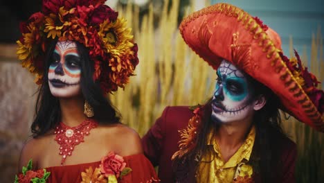 couple in day of the dead costumes