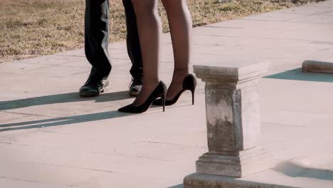 Static-shot-of-a-well-dressed-couple-standing-next-to-each-other-at-a-wedding-reception