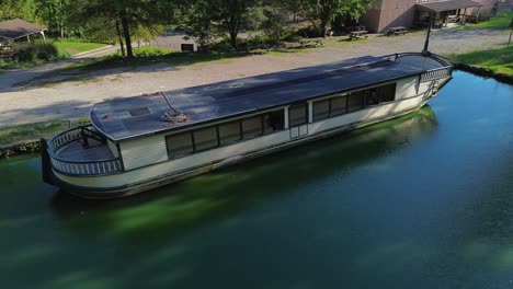 old houseboat on a calm canal