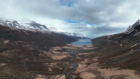 Mjoifjordur-Fjord-During-Cloudy-Day-In-East-Of-Iceland---aerial-forward