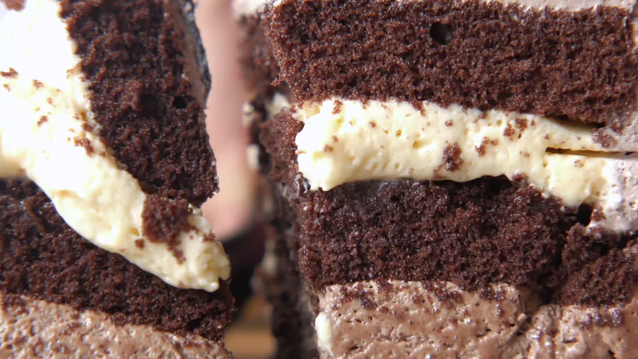 Close-up view of a delicious chocolate cake with whipped cream