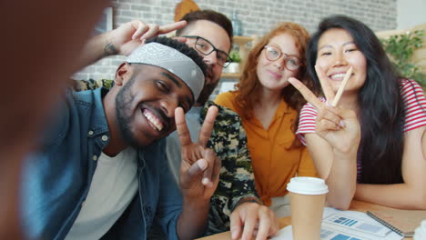 group selfie of friends in the workplace