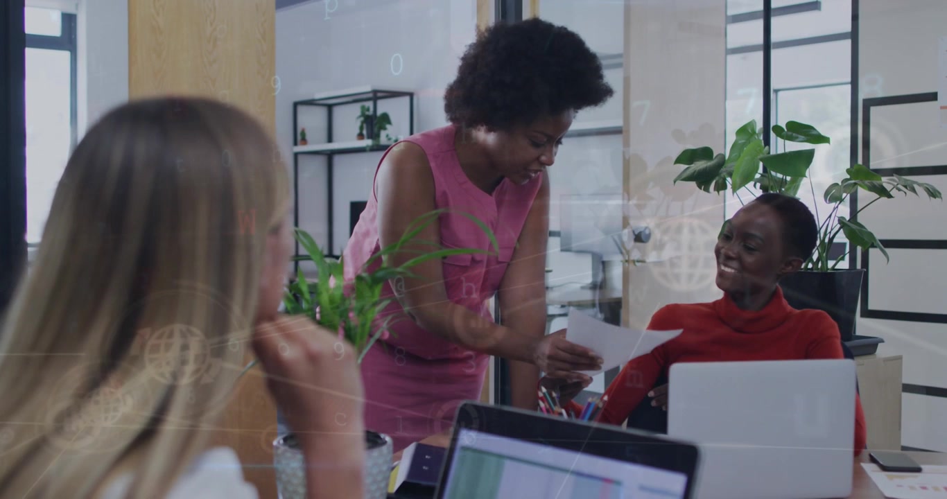 Animation of connected icons, symbols, numbers and letters over diverse coworkers sharing ideas