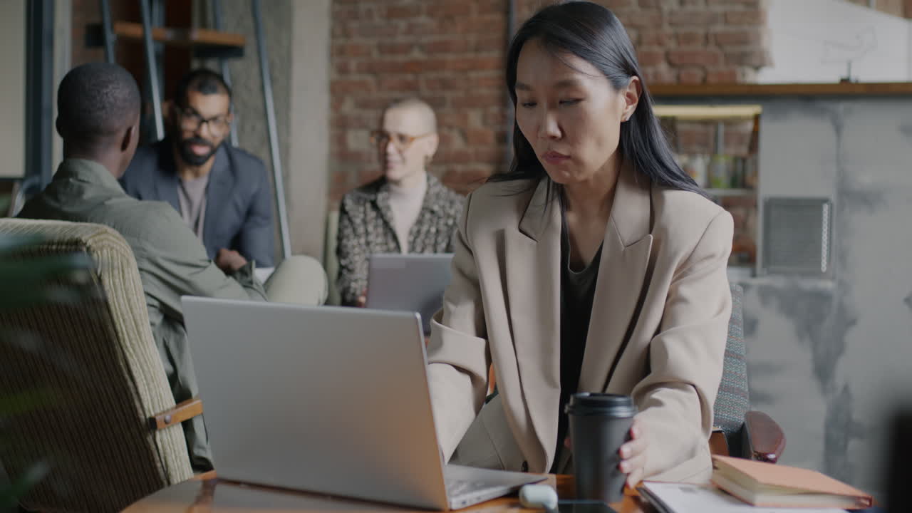 Business Meeting in a Cafe