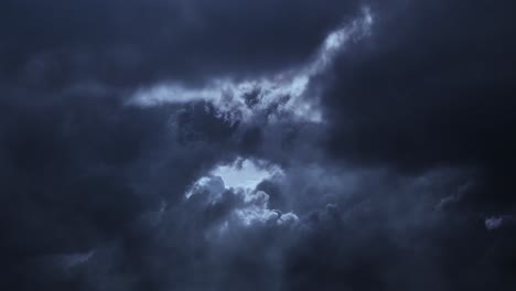 thunderstorm over dark sky and moving clouds