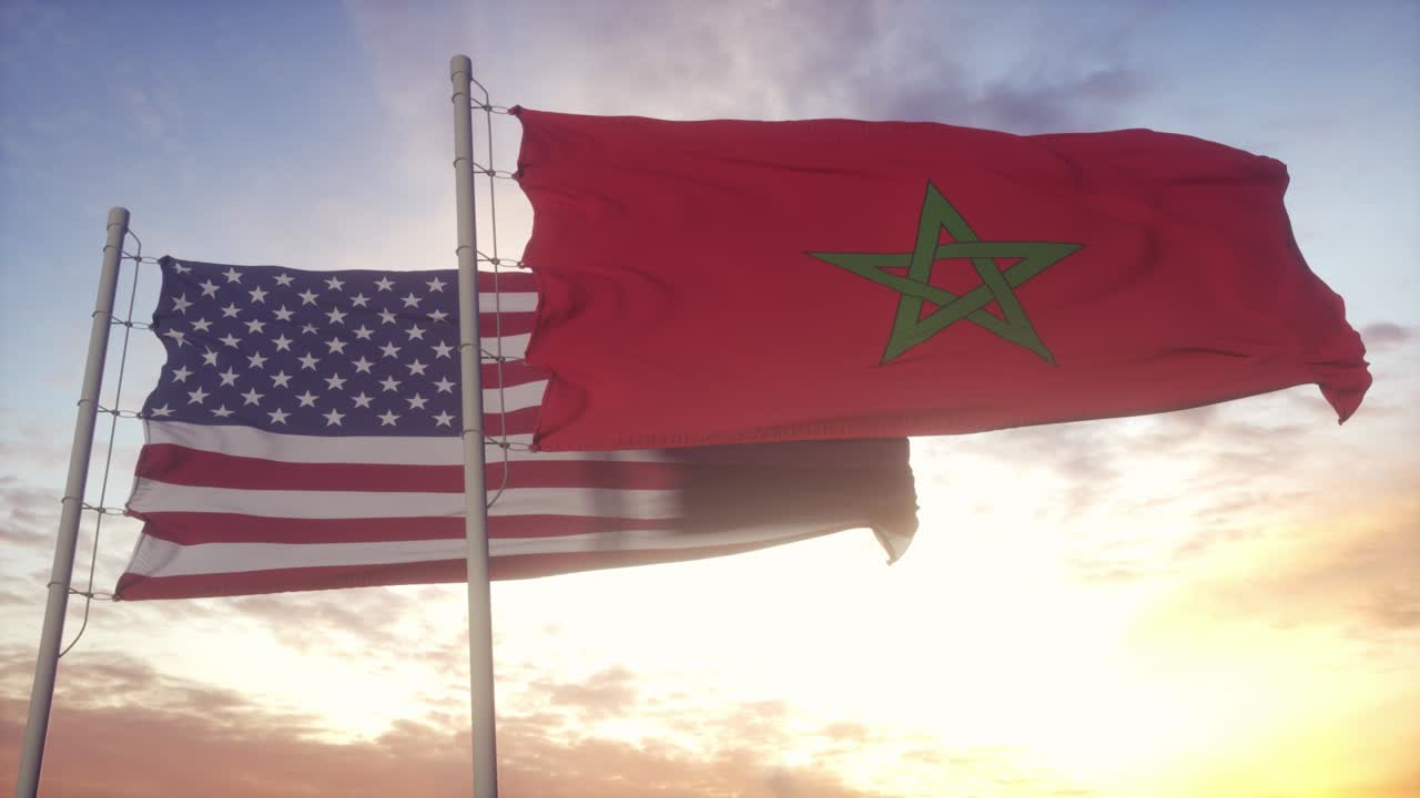 marruecos y estados unidos bandera en el asta de la bandera. marrueco y estados unidos ondeando la bandera en el viento. marruegos y estados unidos concepto diplomático