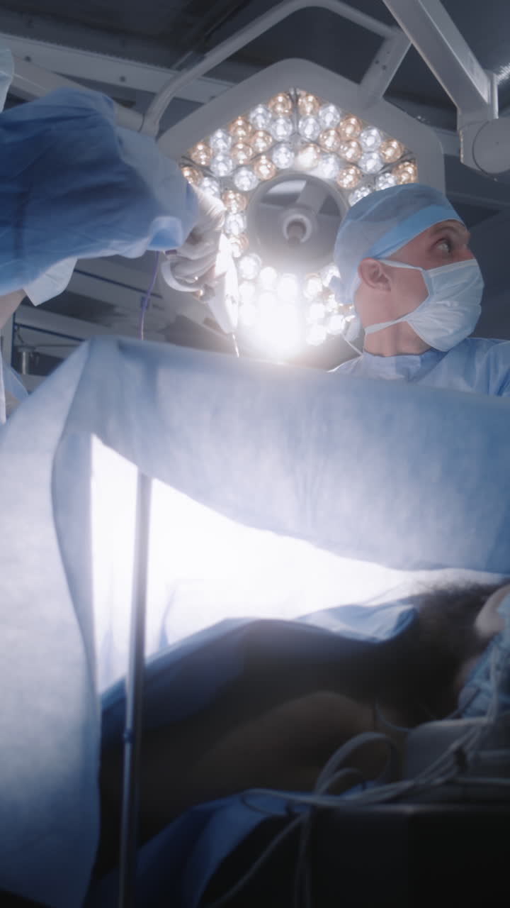 Nurse checks condition of patient on electrocardio 4k 2025 07 22 02 38 17 utc.mov | adult, anesthesia, assist, assistance