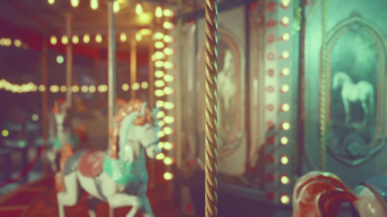 The amusement park sits in silence at night illuminated by glowing lights
