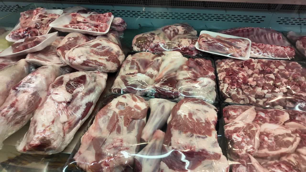 Raw Lamb and Goat Meat Display in a Grocery Store