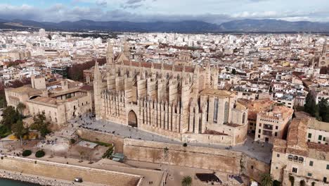 side aerial view of catholic cathedral in city centre old town mallorca spain