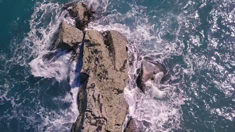 the beautiful water and rocky shore of the south island in new zealand - aerial