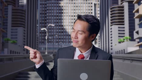 businessman presenting with laptop
