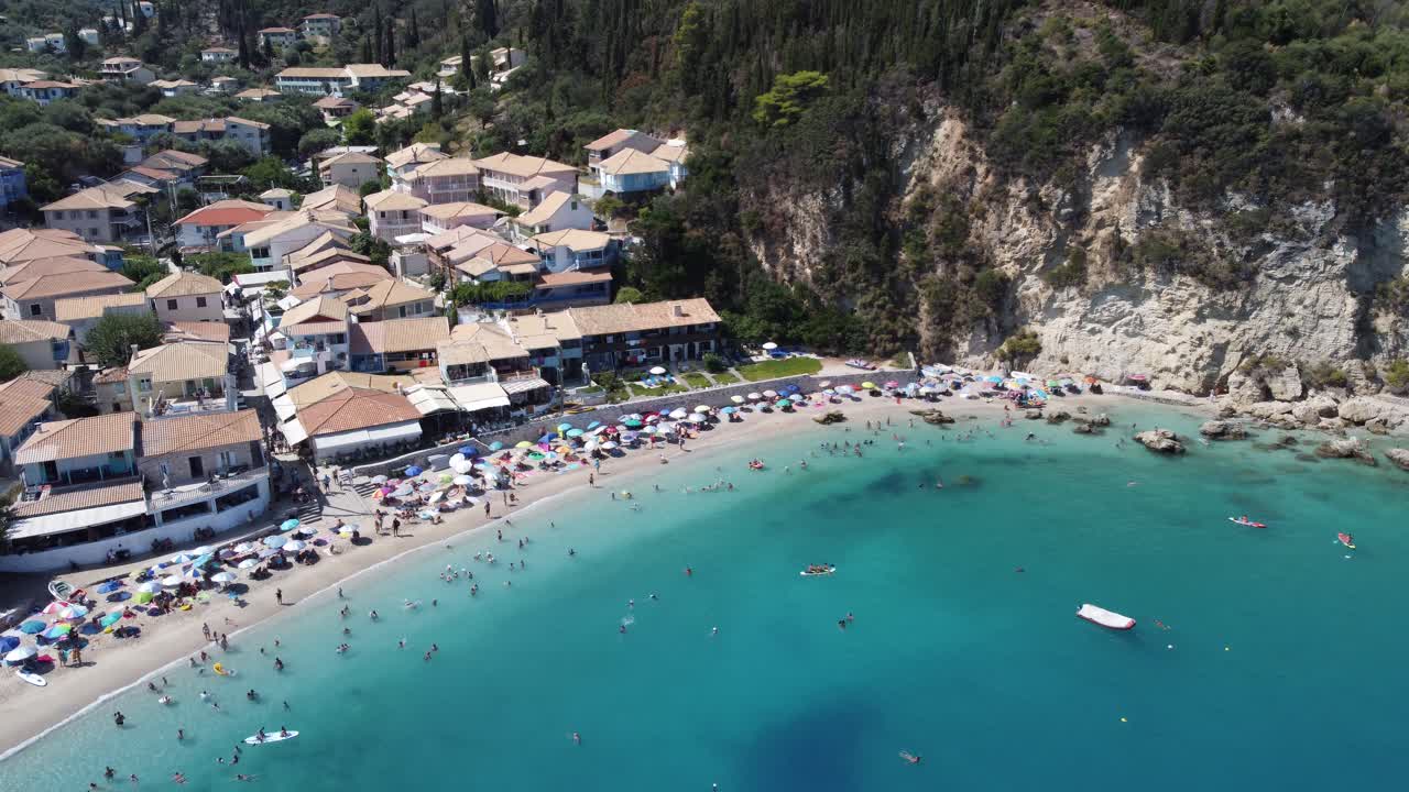 Aerial drone video of small rocky beach next to iconic beach of Milos and Agios Nikitas in island of Lefkada, Ionian, Greece D-Log M profile