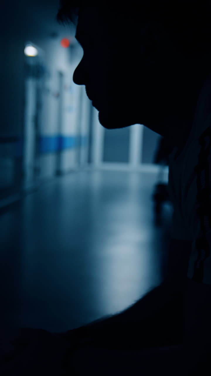 Silhouette of a Person in a Hospital Waiting Room