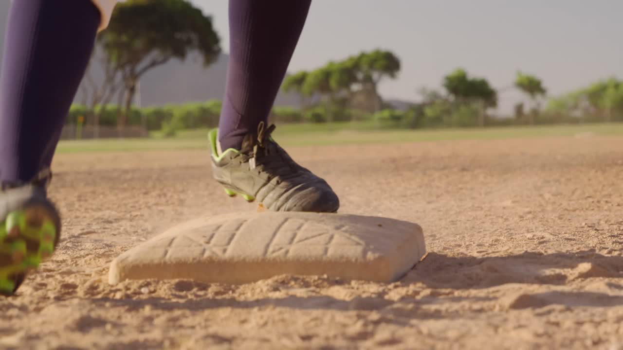 Baseball player running to a base during a match