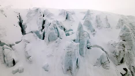 aerial take from a mountain in the swiss alps, nearby the diablerets region