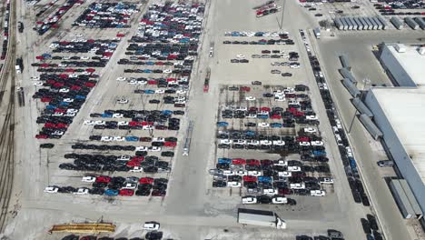 endless number of trucks waiting for microchips due to shortage, sterling heights, michigan, usa