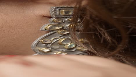 close-up of intricate indian earrings and necklace