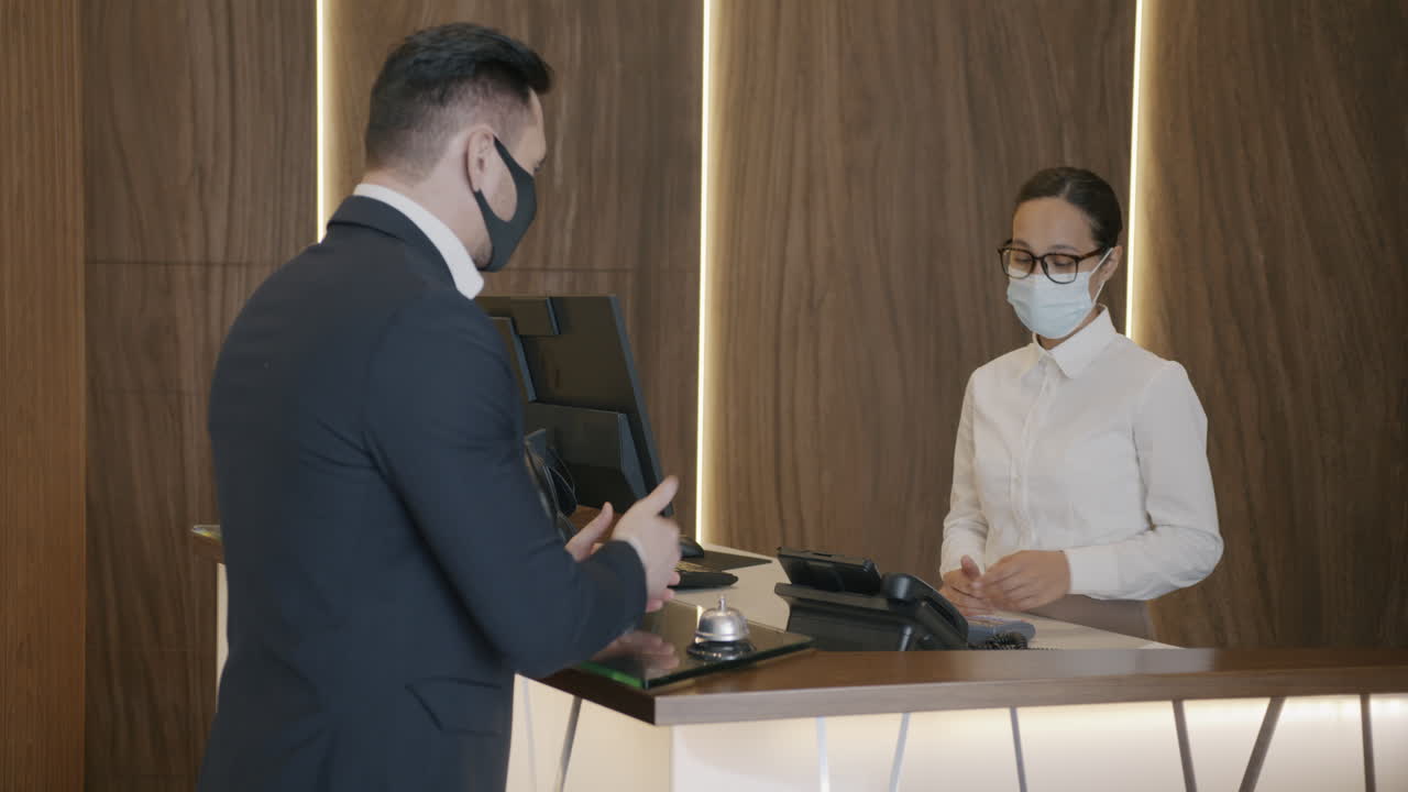 Hotel Check-in with Face Masks