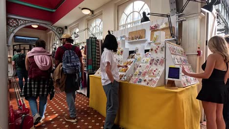 people exploring market stalls in camden town