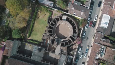 Drone-aerial-of-beautiful-colonial-historic-architecture-of-antigua-Guatemala---Bird'seye-view,-top-perspective-view