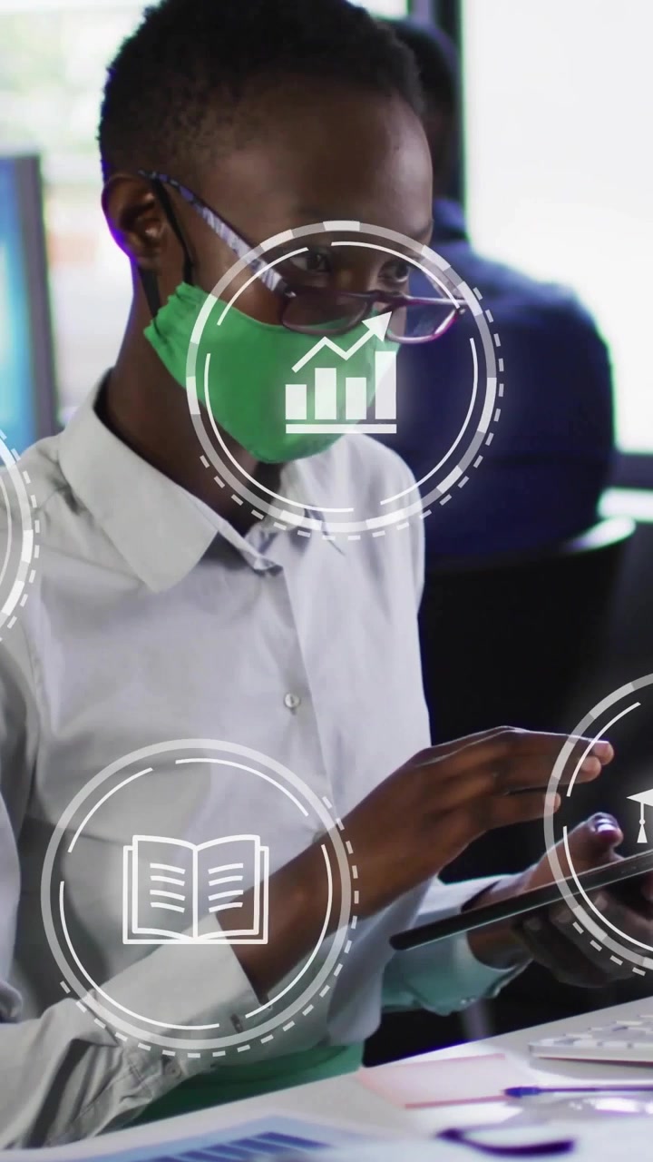 Vertical video: Woman typing keys, tapping tablet, creating education icons floating on face,hands