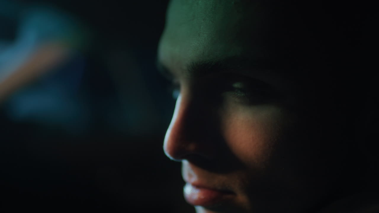 Close-up Portrait of a Man at Night
