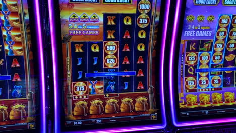 Jackpot-Slot-machines-with-flashing-lights-and-good-luck-in-casino-on-cruise-ship