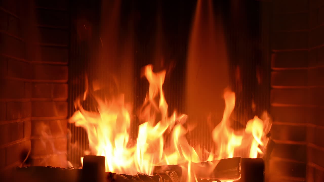 Close up of a wood log burning in a chimney