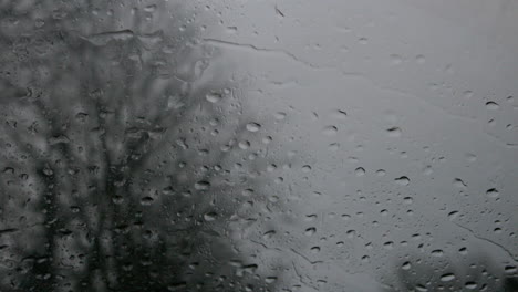 Rain-falling-onto-car-windshield