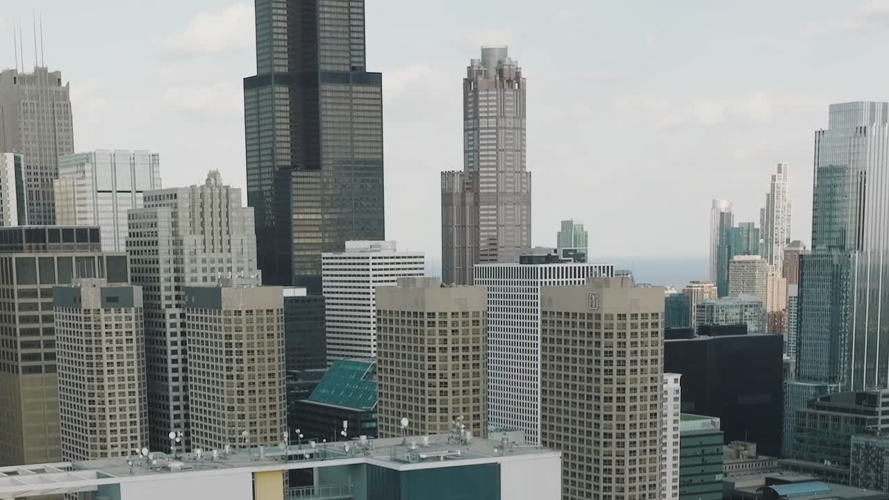 Aerial view of downtown Chicago showcasing its skyline and tall buildings