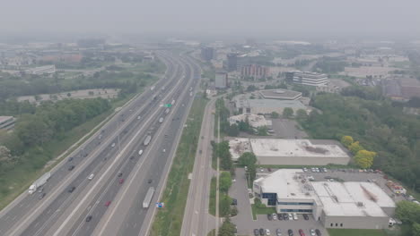 heavy smoke from the mississauga wildfire casts a haze over the cityscape and highway