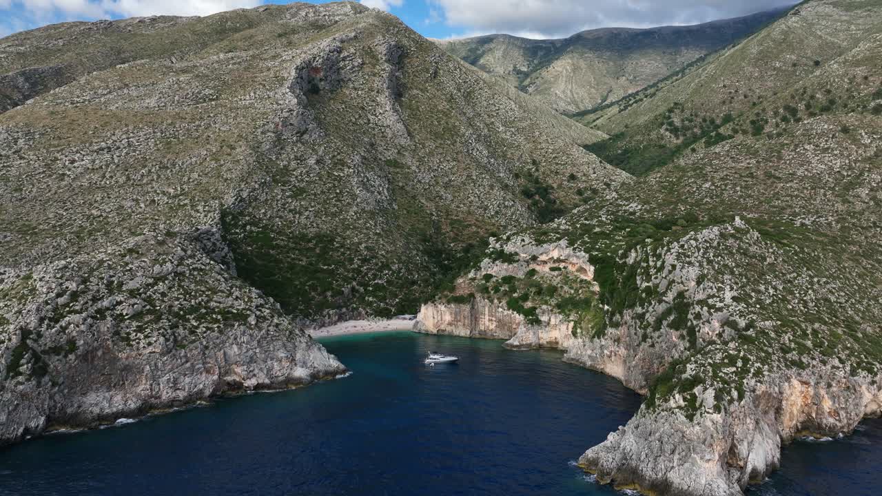 Shpella e Pëllumbave Beach On The Ionian Coast Near Ksamil In The South of Albania. Aerial Drone Shot