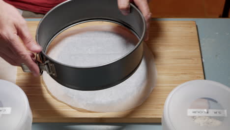 male preparing a chocolate cake