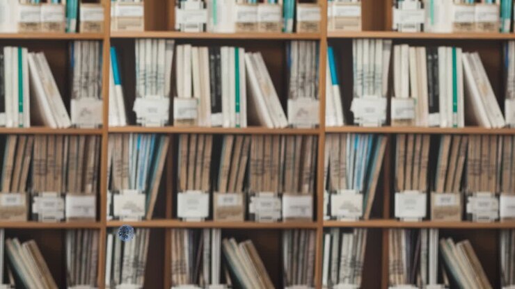 Animation of old skool vs new school text on blue circle moving over books on library shelves